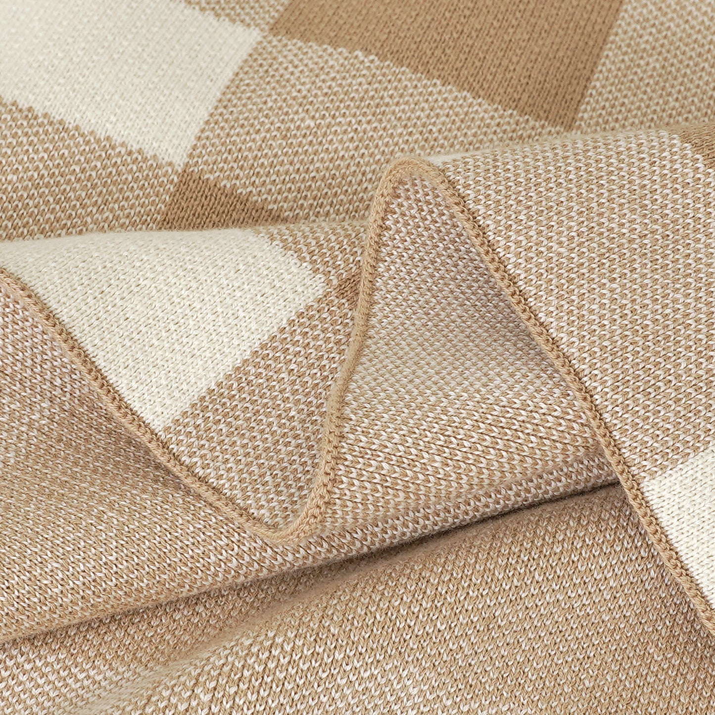 Close-up of Jeremiah 29:11 “Grow & Prosper” baby blanket with light brown and beige knitted stripes, showing soft fabric.