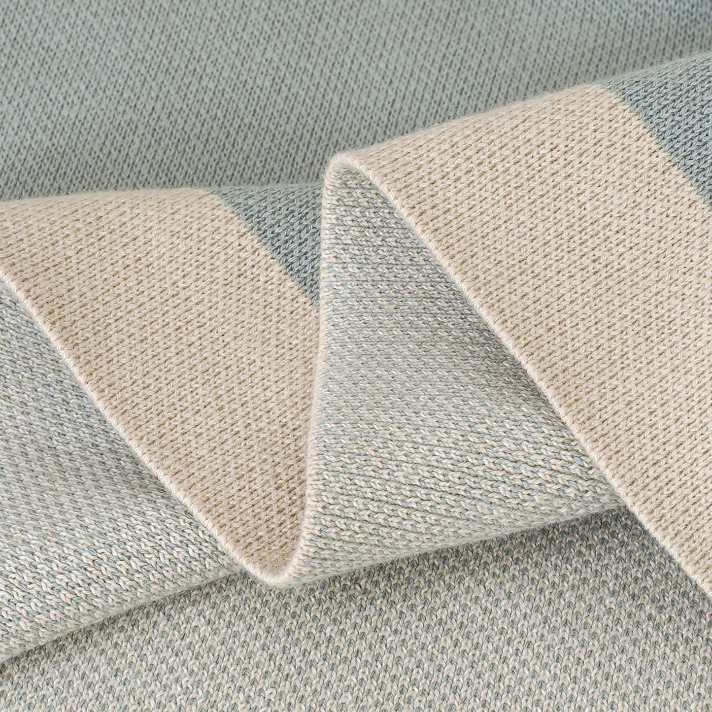 Close-up of You Are the Light Matthew 5:14 baby blanket, soft knit light green & cream stripes, 100% cotton.